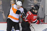 May 6, 2012; Newark, NJ, USA; Philadelphia Flyers left wing James van Riemsdyk (21) gets hit by New Jersey Devils defenseman Anton Volchenkov (28) during the second period in game four of the 2012 Eastern Conference semifinals at the Prudential Center.  Mandatory Credit: Ed Mulholland-US PRESSWIRE